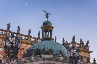 Figures and statues at the new palace in Sanssouci Park in the evening light, Potsdam