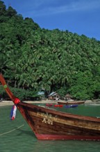 Bamboo huts, longtail boat on Ko Phi Phi Don beach, two years in front of the tsunami, Thailand,