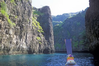 Boat trip through rocky bay, Ko Phi Phi Don, Thailand, December 2002, vintage, retro, old, historic