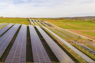 Wide solar fields spanning the hilly landscape, energy revolution, construction of PV open space,