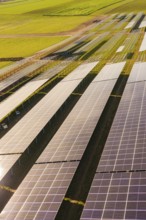 Detailed view of solar panels in a field in a green area, energy revolution, construction of PV