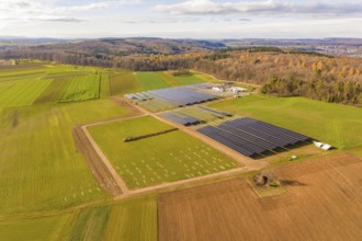 Extensive solar systems in a green and brown landscape, energy revolution, construction of PV open