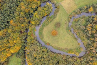 Aerial view of the winding Hunte river in autumn landscape Aerial view Vertical aerial view,