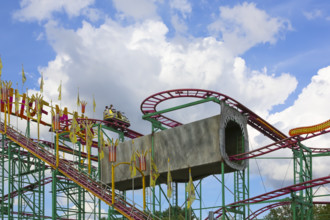 Wilde Maus, little rollercoaster for children, fairground in Friedrichsau Ulm, public festival,