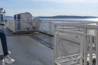 Passenger enjoying the scenic ferry ride from victoria, vancouver island, to vancouver, british