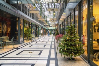 Christmassy decorated and modern shopping arcade with glass roof, Calwer Passage, Stuttgart,