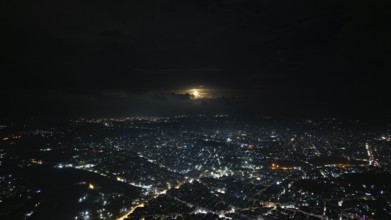 A Drone night view of Aleppo, Syria on December 19, 2025, showing illuminated streets, dense
