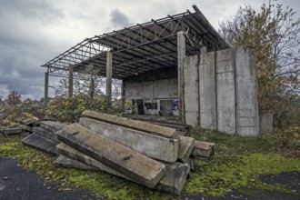 Old building, dilapidated site of a former agricultural production cooperative of the former GDR,
