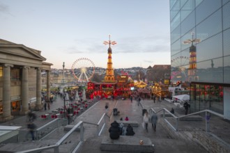 Stuttgart 2025 Christmas market on Schlossplatz with festive lights, a Christmas pyramid, mulled