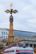 An ambulance is parked at the Stuttgart Christmas market to provide rapid medical assistance. The