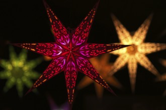Colorful Christmas stars, sales stand, baroque Christmas market, blue hour, dusk, Ludwigsburg,