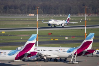 Eurowings aircraft, on field positions and on landing, Düsseldorf airport, DUS