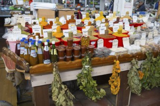Market stand with a wide range of spices, herbs and pickled products, Akhaltsikhe market,