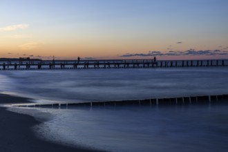 Groves and wooden walkway in the sea, sunset, long exposure, Zingst, Fischland-Darß-Zingst, Western