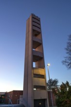Bell tower of Nicodemus Church in the evening, Röthenbach near Schweinau district, Nuremberg,