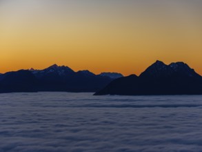 Dusk in the mountains, in the Fog Sea Valley, Chiemgau Alps, Upper Bavaria, Bavaria, Germany