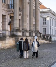 Young musicians with their instruments on their way to Unter den Linden music school, Berlin,