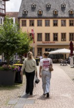 Young tourists in the old town of Fulda, Hesse, Germany