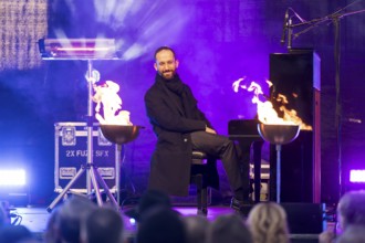 Igor Levit (pianist) plays the piano at the lighting of the 20th anniversary Hanukkah in front of
