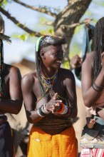 Traditional dance, brightly decorated woman of the Hakaona tribe also dance Havakona or Hakawona,