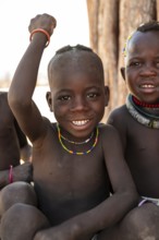 Portrait, funny Himba child, traditional Himba village, Kaokoveld, Kunene, Namibia
