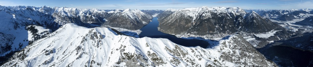 Aerial view, epic view of mountain landscape with snow in winter, summit of Bärenkopf, Achensee,