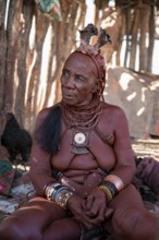 Elderly Himba woman, portrait, traditional Himba village, Kaokoveld, Kunene, Namibia