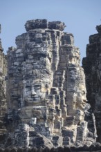 Huge stone-carved faces of Bodhisattva Lokeshvara, also Avalokiteshvara, Bayon Temple, Angkor Thom,