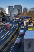 The A40 motorway, Ruhrschnellweg, in Essen, city skyline, Evonik office building, traffic jam in