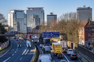 The A40 motorway, Ruhrschnellweg, in Essen, city skyline, Evonik office building, traffic jam in
