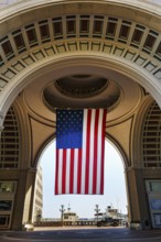 American flag fluttering, distinctive archway, Boston Harbor Hotel, Rowes Wharf, Freedom Trail,