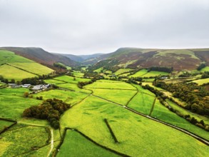 Autumn colours of Farms over River Wye and Road A470 from a drone, Llanidloes, Powys,