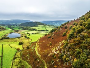 Autumn Colours over Gwynllyn Lake and Stream Nantgwynllyn from a drone, Rhayader, Powys,