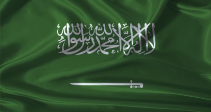 National flag of Saudi Arabia with cloth texture. Saudi Arabia flag with realistic texture