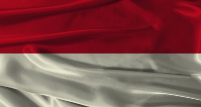 Flag of Indonesia with fabric textured background. Close up of National flag of Indonesia with