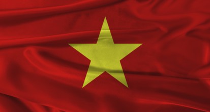 Flag of Vietnam with fabric textured background. Close up of National flag of Vietnam with