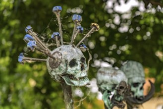 Skull Tree sculpture by Daniel Spoerri, sculpture park of the Gottorf Castle Museum Island, City of