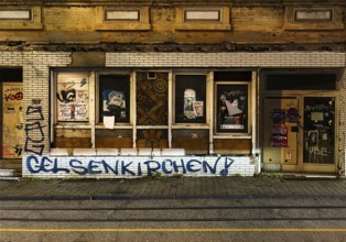 Decaying façade covered with graffiti, no-go area in Gelsenkirchen, one of the poorest cities in