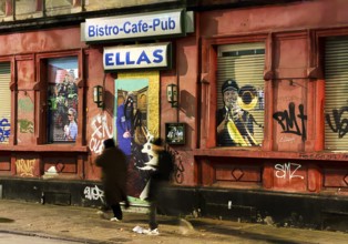 Decaying façade covered with graffiti in a no-go area, Gelsenkirchen, Ruhr area, North