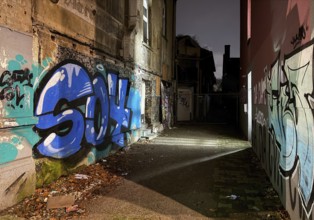 Decaying façade smeared with graffiti, scrap property in a no-go area, Gelsenkirchen, Ruhr area,