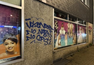 Facade smeared with Ückendorf No Nazis No Cops in one of the poorest cities in Germany,