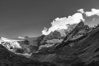 The Moiry glacier with the snow-capped peaks of the Grand Cornier, Tete Blanche and Pointe Moiry