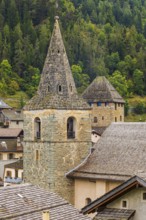 Church tower of the Sainte-Euphemie church and behind it the tower of Anniviers, also known as