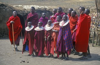 Maasai men and girls in their village in Ngorongoro Crater, Tanzania, Africa, June 2000, vintage,