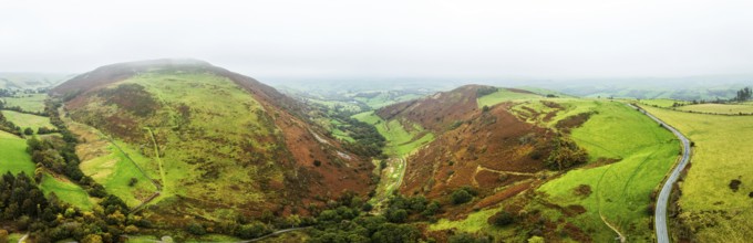 Autumn colours over Llyn Clywedog and Clywedog Reservoir from a drone, Llanidloes, Wales, UK