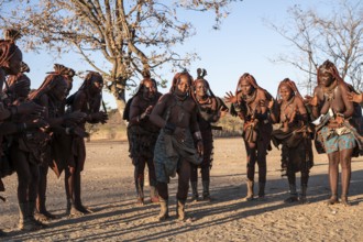 Himba woman dancing euphorically, traditional dance, traditional Himba village, Kaokoveld, Kunene,