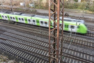 S-Bahn train on the route east, in front of Essen main station, regional transport in North