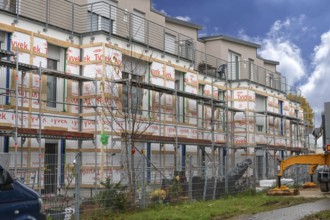 Installation of thermal insulation on a residential block, Eckental, Middle Franconia, Bavaria,