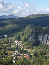 Mountain landscape with forest, rocks and village, view of Oybin, Zittau Mountains, Saxony, Germany
