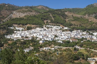 Village Casarabonela, typical white houses, mountain range Sierra de las Nieves, Andalusia, Spain